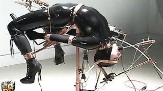 Latex hogtied bondage