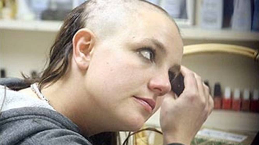 Woman gets head shaved