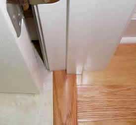 Install t strip laminate floor