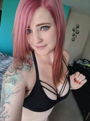 Pink hair tattooed punk girl